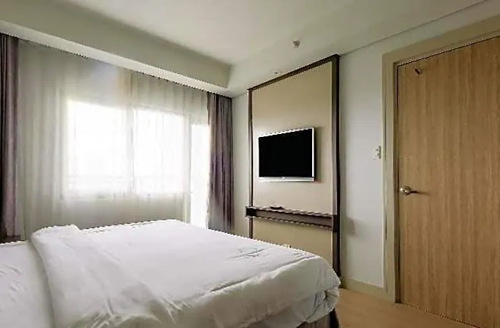 Hotel Capital O 804 The Residences At Bonifacio Civic Center Manila